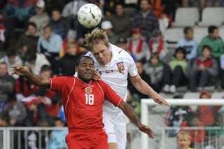 Czech Republic defender Martin Klein wins a header against Malta's Jamie Pace in a friendly in June 2009.