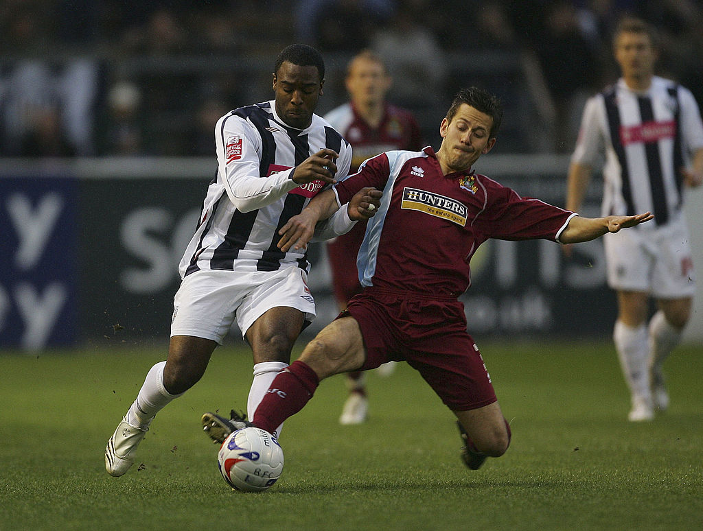 BURNLEY, UNITED KINGDOM - APRIL 23: Nathan Ellington of West Bromwich Albion and Jon Harley of Burnley in action during the Coca Cola Championship match between Burnley and West Bromwich Albion at Turf Moor on April 23, 2007 in Burnley, England (Photo by Gary M. Prior/Getty Images).