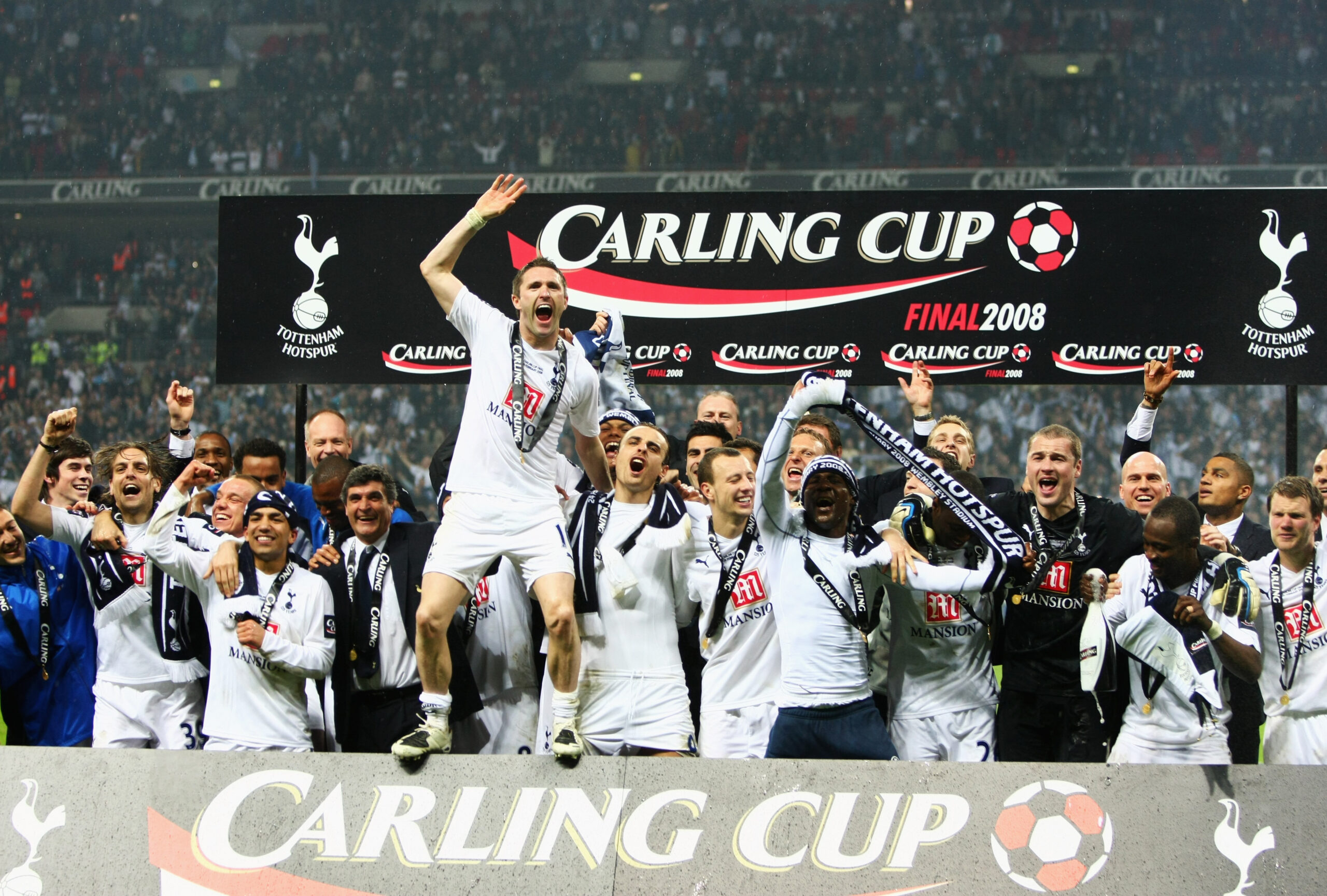 Tottenham players celebrate their League Cup final win over Chelsea in February 2008.