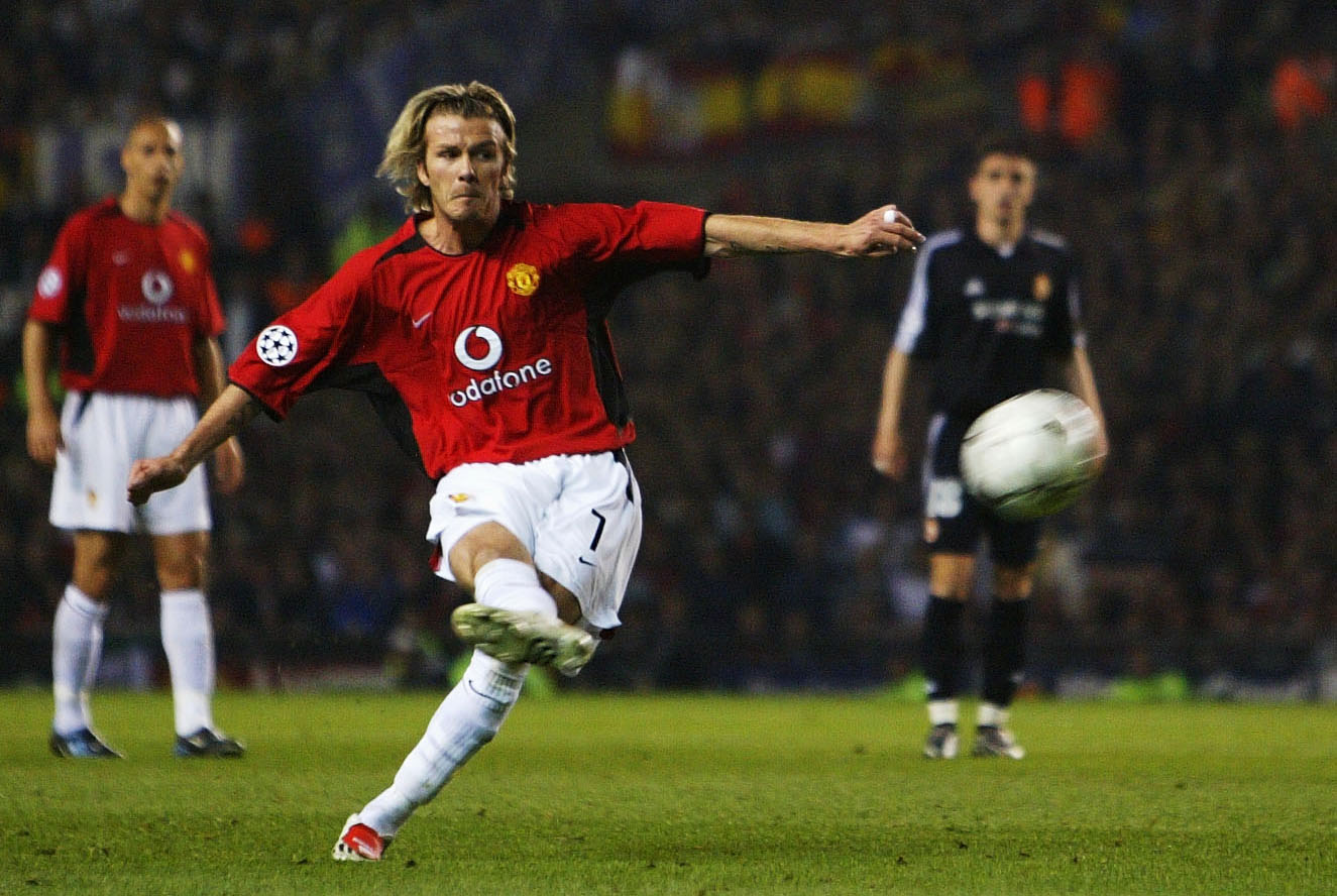 David Beckham scores a free-kick for Manchester United against Real Madrid in the Champions League in April 2003.