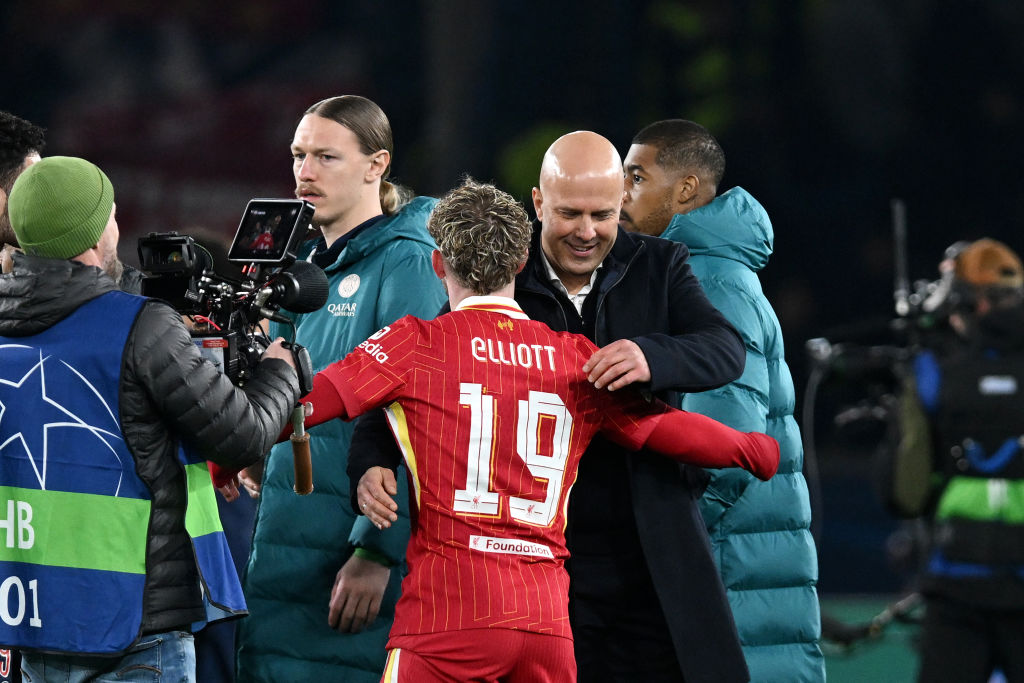 Arne Slot embraces Harvey Elliott after his Champions League winner against PSG