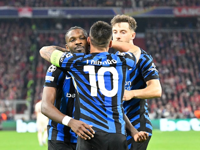 Inter Milan's Lautaro Martinez celebrates his goal with Marcus Thuram and Carlos Augusto on April 8, 2025