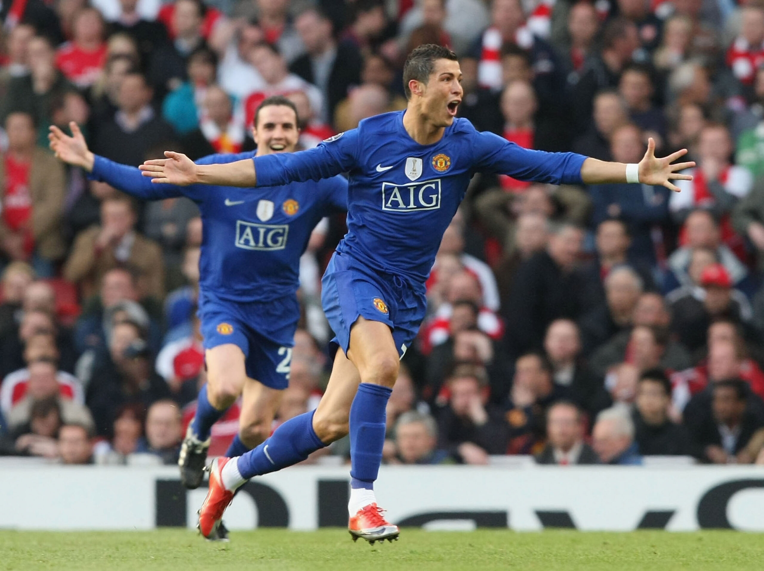 Cristiano Ronaldo celebrates after scoring for Manchester United against Arsenal in the Champions League at the Emirates Stadium in May 2009.