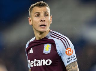 Luca Digne of Aston Villa looks on during the Premier League match against Brighton & Hove Albion at the American Express Stadium in Falmer, England on 2 April, 2025.