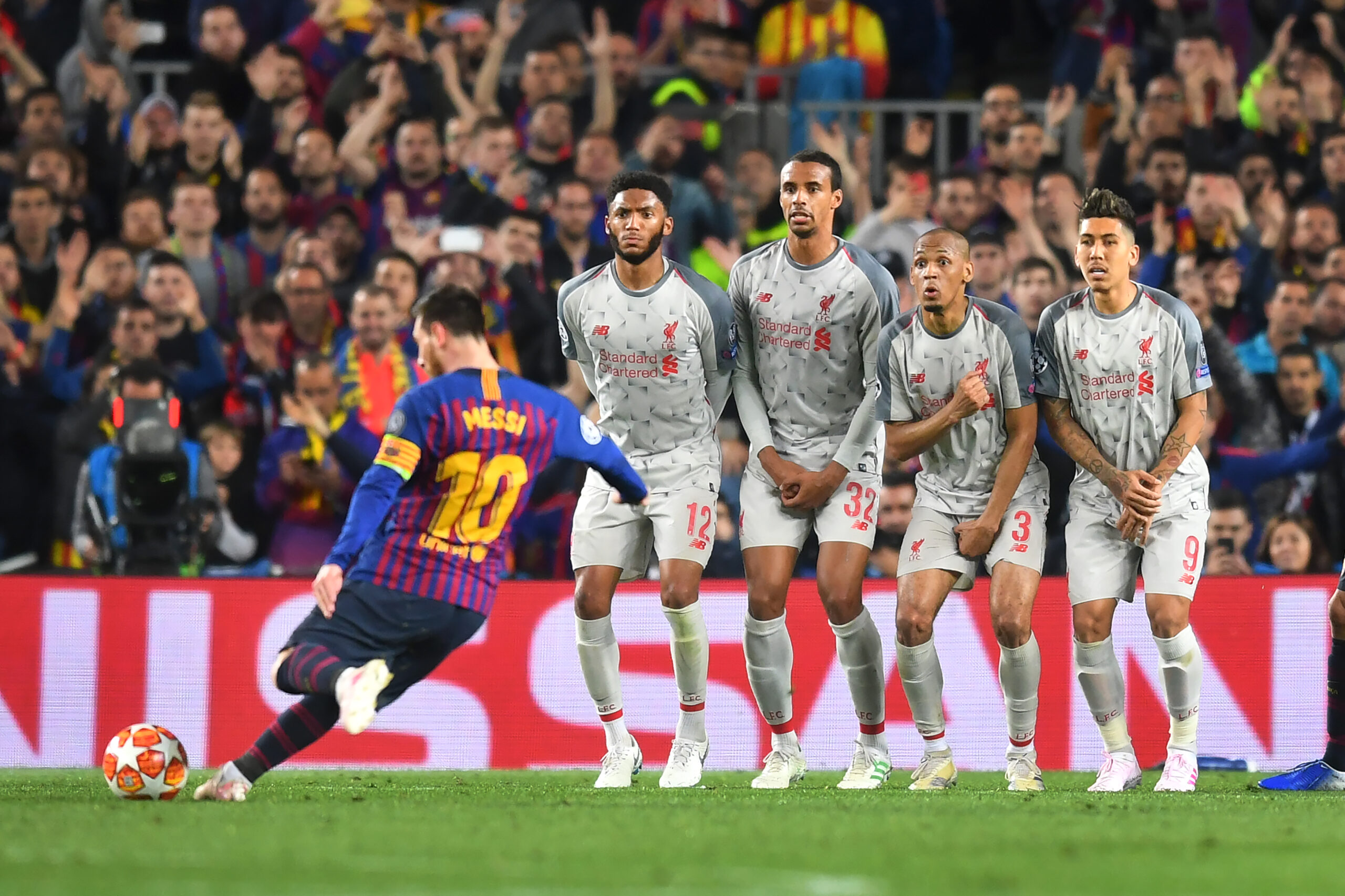 Lionel Messi scores a free-kick for Barcelona against Liverpool in the Champions League quarter-finals in May 2019.