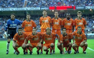 Valencia players line up ahead of a match against Real Madrid in October 1999.