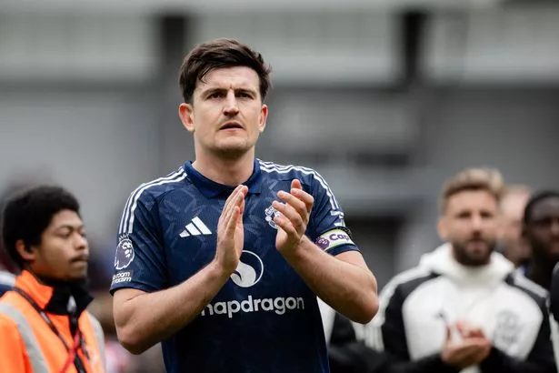 Harry Maguire of Manchester United applauds the fans after the Premier League match between Brentford FC and Manchester United FC at Brentford Community Stadium on May 04, 2025 in Brentford, England.