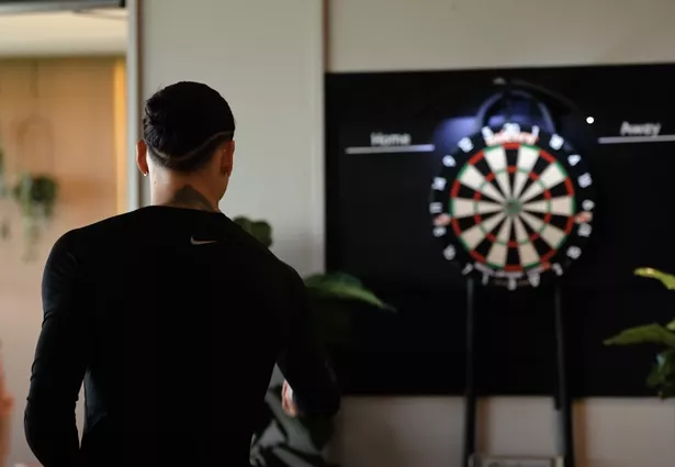 Darwin Nunez playing darts