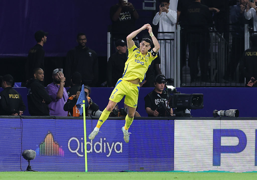 RIYADH, SAUDI ARABIA - APRIL 04: Cristiano Ronaldo of Al Nassr celebrates scoring his team's third goal with teammate Jhon Duran during the Saudi Pro League match between Al Hilal v Al Nassr in the Kingdom Arena on April 04, 2025 in Riyadh, Saudi Arabia. (Photo by Yasser Bakhsh/Getty Images)