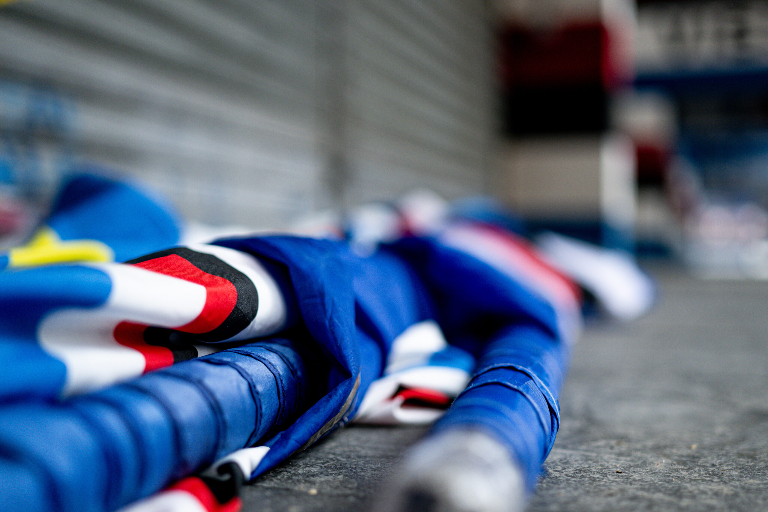 A rolled up Sampdoria flag on the floor of the stadium