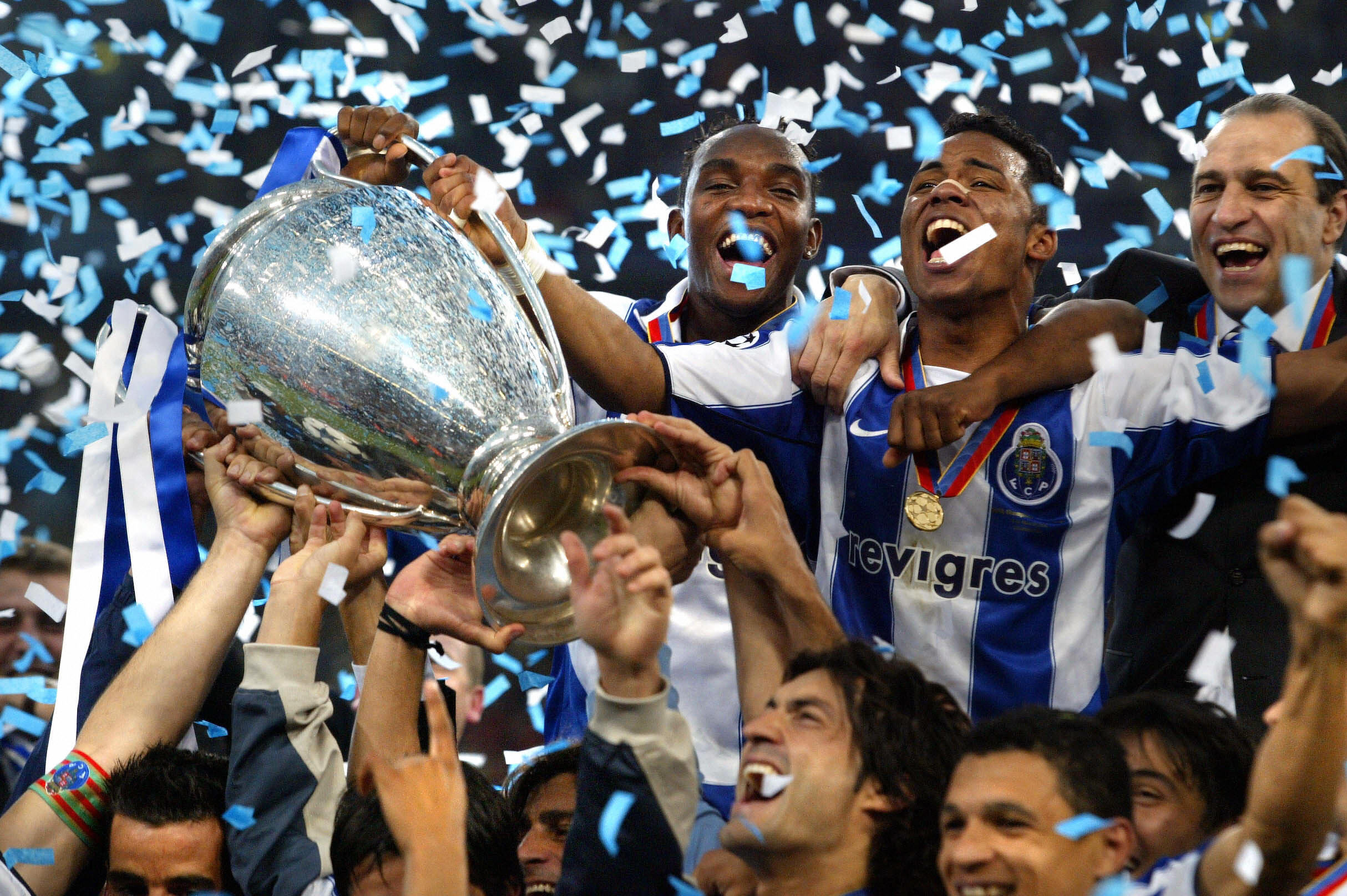 Porto players celebrate their Champions League final win over Monaco in 2004.