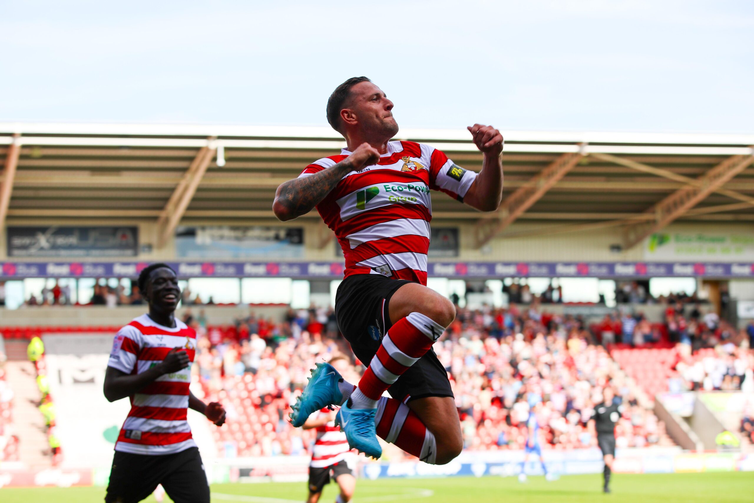 Billy Sharp celebrates after scoring for Doncaster Rovers against Accrington Stanley in League Two, August 2024