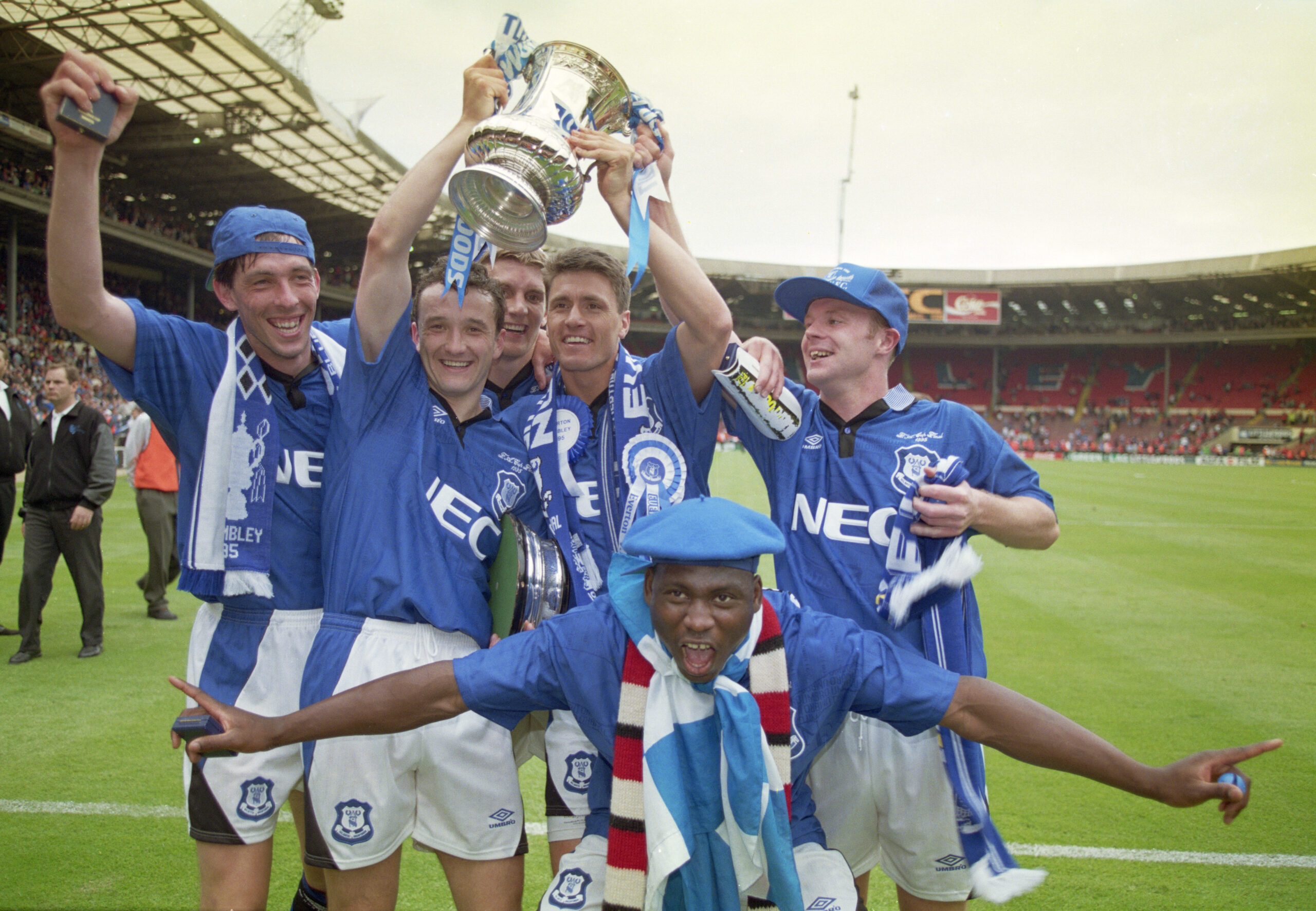 Everton players celebrate with the trophy after victory over Manchester United in the 1995 FA Cup final at Wembley.