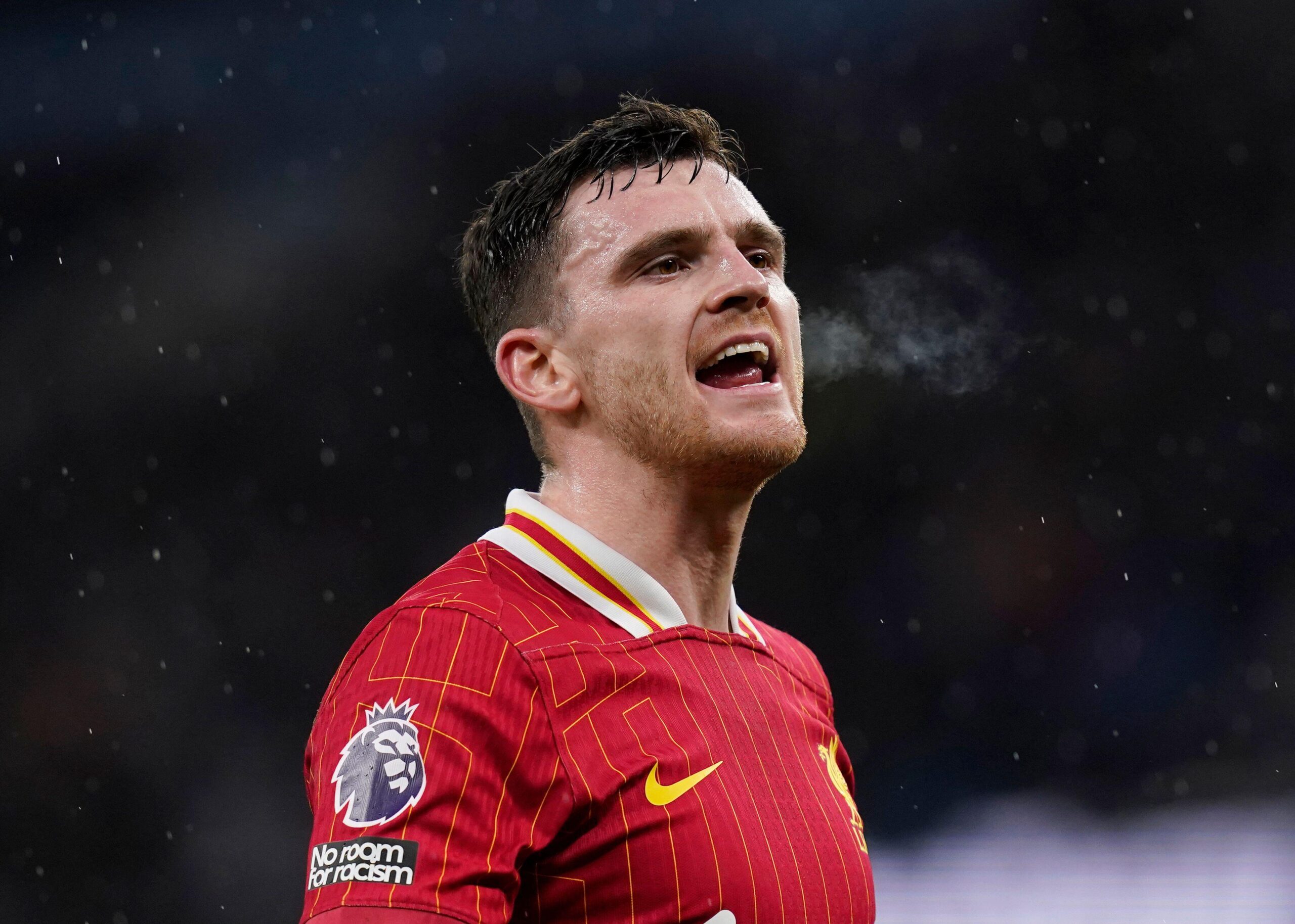 Andy Robertson of Liverpool reacts during the Premier League match against Manchester City at the Etihad Stadium in Manchester, UK on 23 February, 2025.