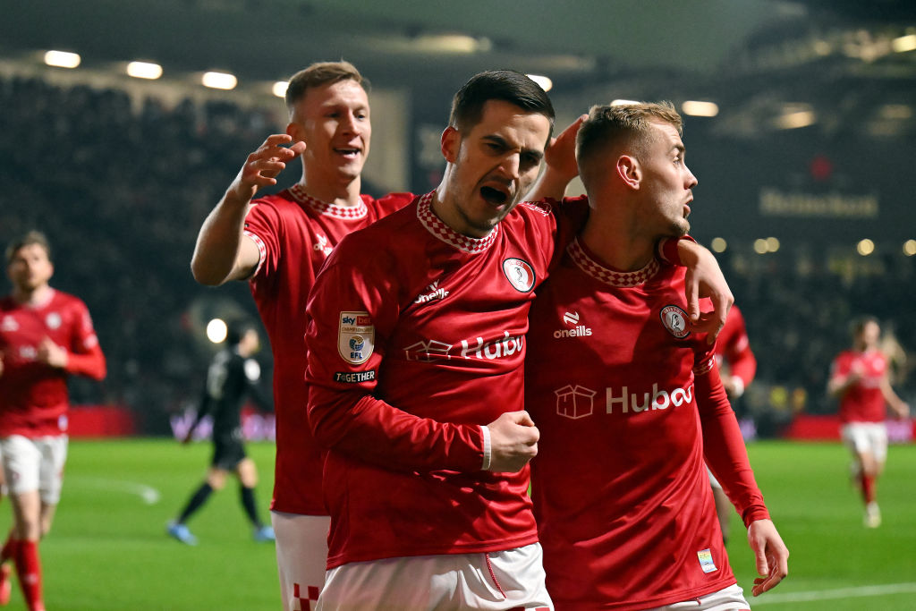 Anis Mehmeti of Bristol City celebrates with team mate Mark Sykes after scoring the opening goal in the Sky Bet Championship match between Bristol City FC and Stoke City FC at Ashton Gate on February 12, 2025 in Bristol, England.