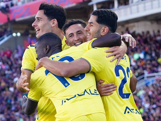 Villarreal's Ayoze Perez celebrates scoring with teammates on May 18, 2025