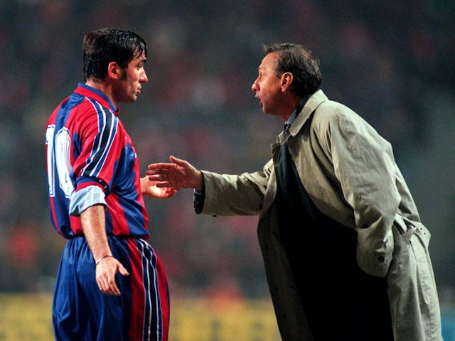Barcelona manager Johan Cruyff gives instructions to Gheorghe Hagi on March 3, 1996