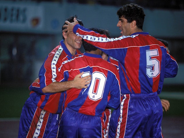 Barcelona's Hristo Stoichkov and Romario celebrate with Miguel Angel Nadal in 1995