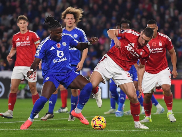 Nikola Milenkovic of Nottingham Forest battles for the ball with Caleb Okoli of Leicester City during the Premier League match on October 25, 2024