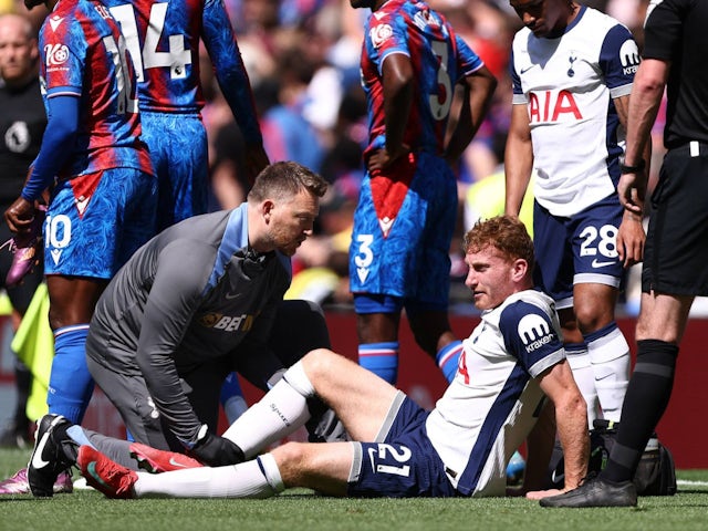 Tottenham Hotspur's Dejan Kulusevski receives treatement on May 11, 2025
