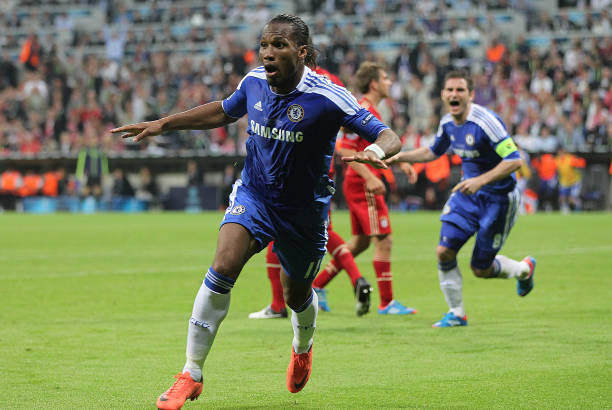 MUNICH, GERMANY - MAY 19: Didier Drogba of Chelsea celebrates after scoring his team's equalizing goal during UEFA Champions League Final between FC Bayern Muenchen and Chelsea at the Fussball Arena München on May 19, 2012 in Munich, Germany.