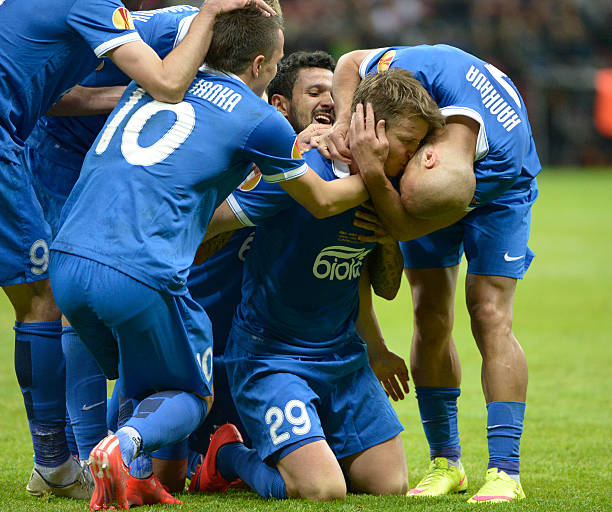FC Dnipro WARSAW, POLAND - MAY 27: Ruslan Rotan (number 29) is surrounded by team-mates after scoring Dnipro's second goal during the UEFA Europa League Final match between FC Dnipro Dnipropetrovsk and FC Sevilla on May 27, 2015 in Warsaw , Poland. Sevilla won the match 3-2.