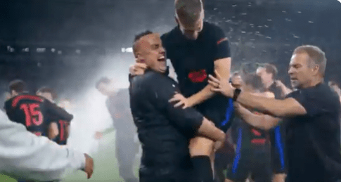 Soccer players celebrating a victory.