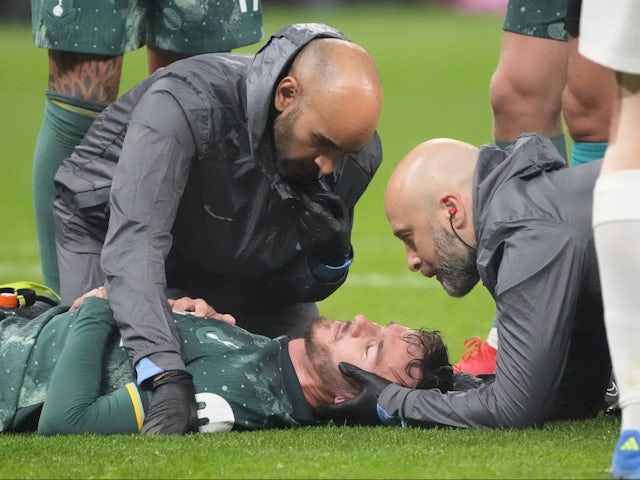 Tottenham Hotspur's James Maddison is treated for an injury on April 17, 2025