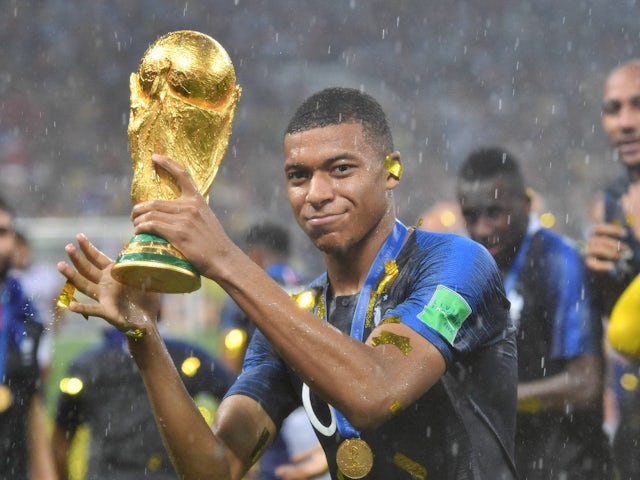 France's Kylian Mbappe with the World Cup trophy in 2018