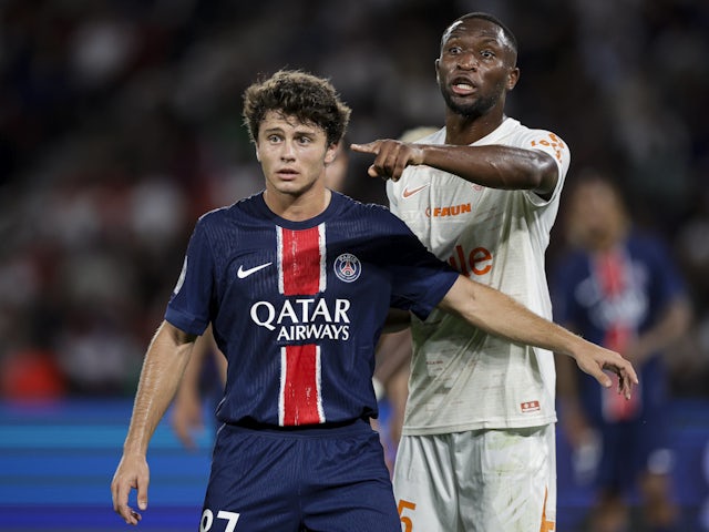 Paris Saint-Germain midfielder Joao Neves and Montpellier HSC defender Modibo Sagnan in August 2024.