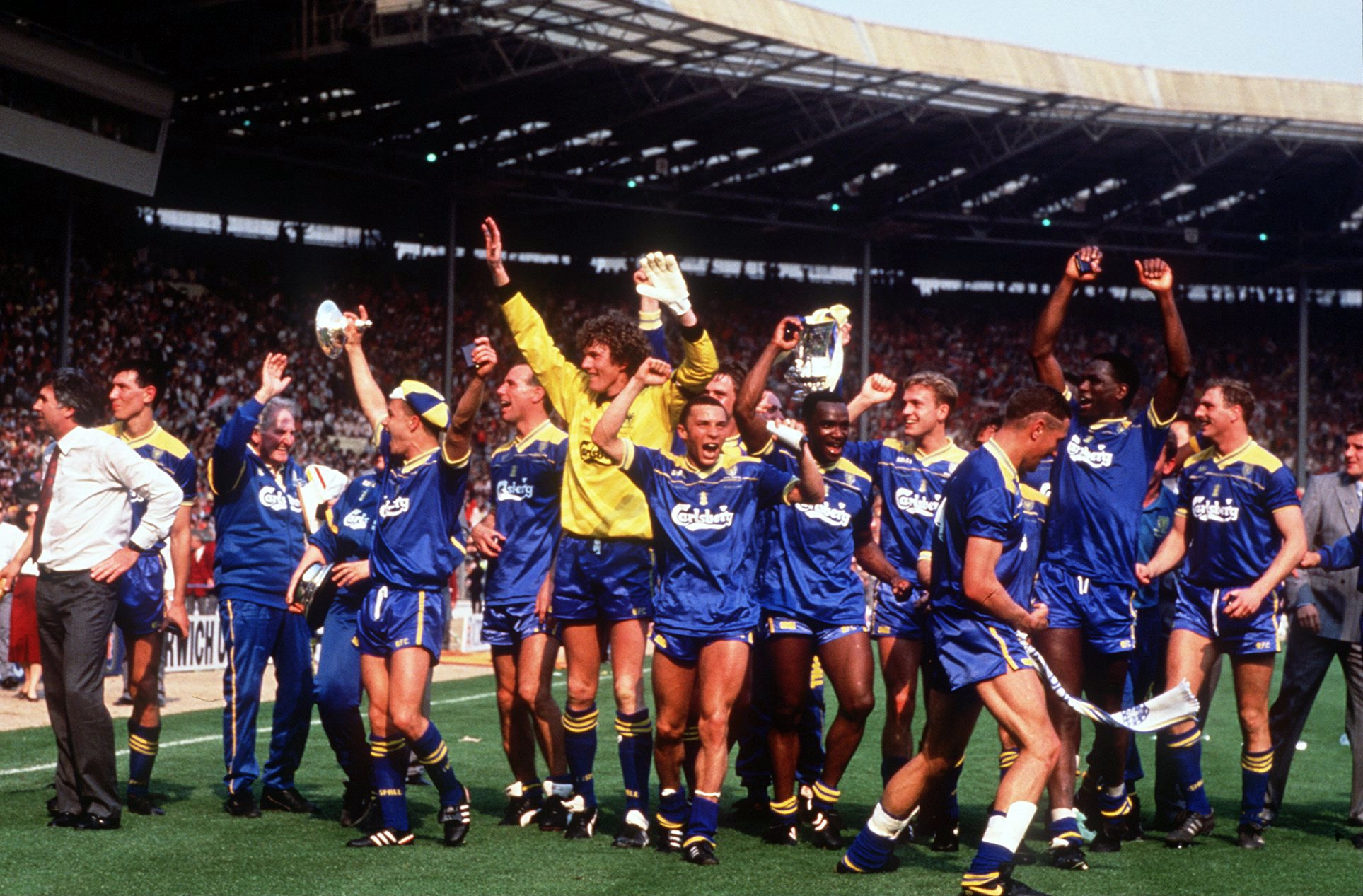 Wimbledon players celebrate their FA Cup final win over Liverpool at Wembley in May 1988.