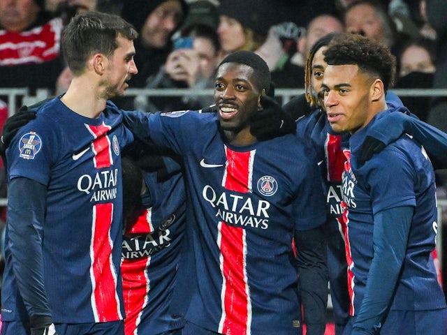 Paris Saint-Germain's Ousmane Dembele celebrates with Fabian Ruiz and Desire Doue on February 1, 2025