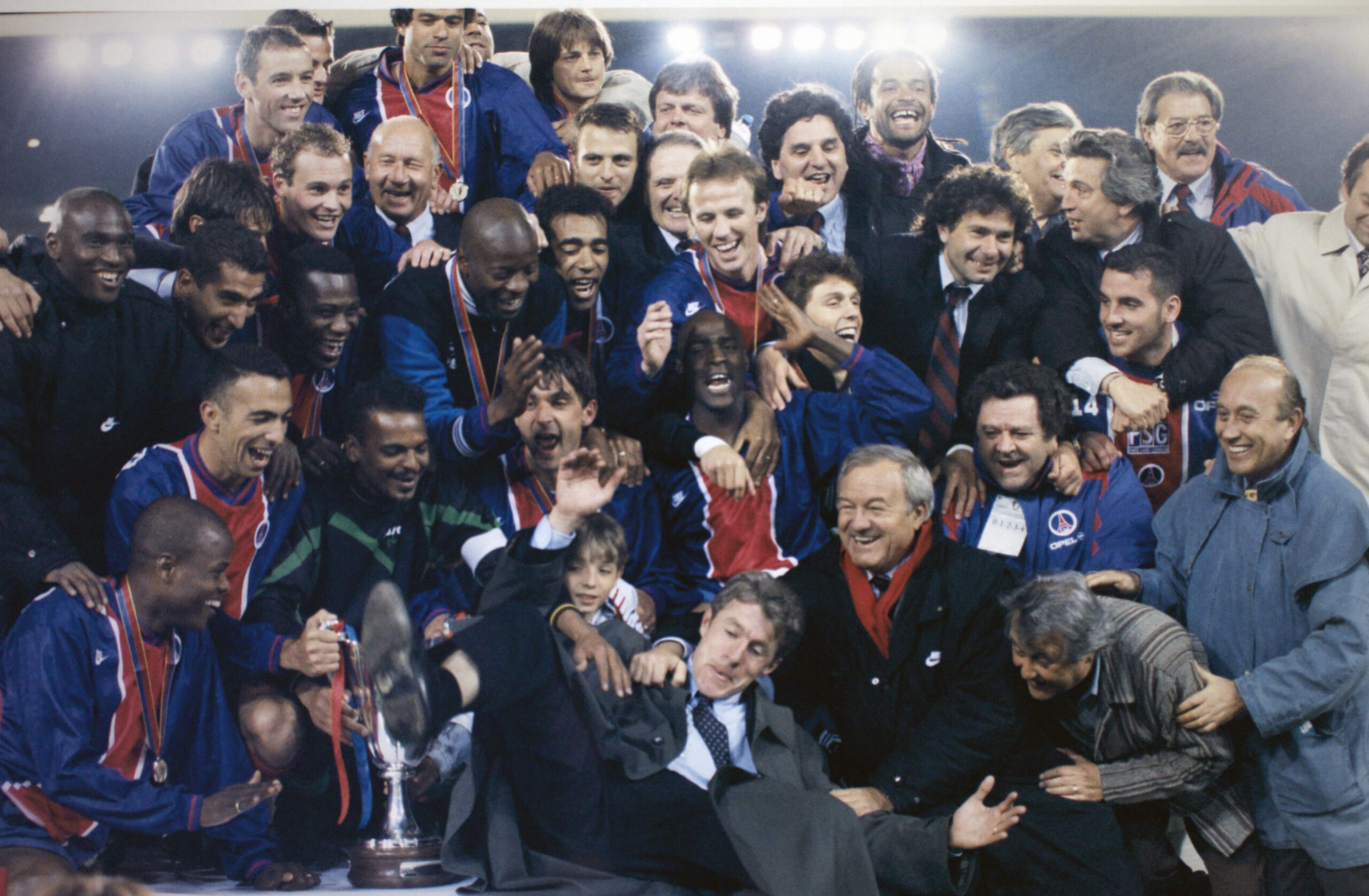 Paris Saint-Germain players celebrate their UEFA Cup Winners' Cup final win over Rapid Wien in Brussels in May 1996.