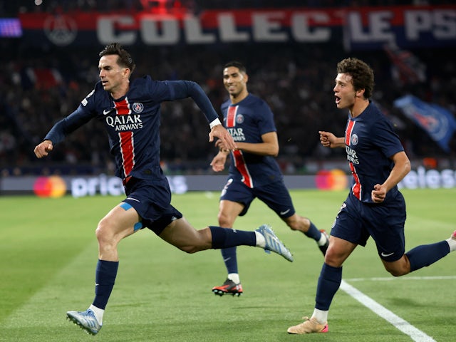 Paris Saint-Germain's Fabian Ruiz celebrates with Joao Neves and Achraf Hakimi on May 7, 2025