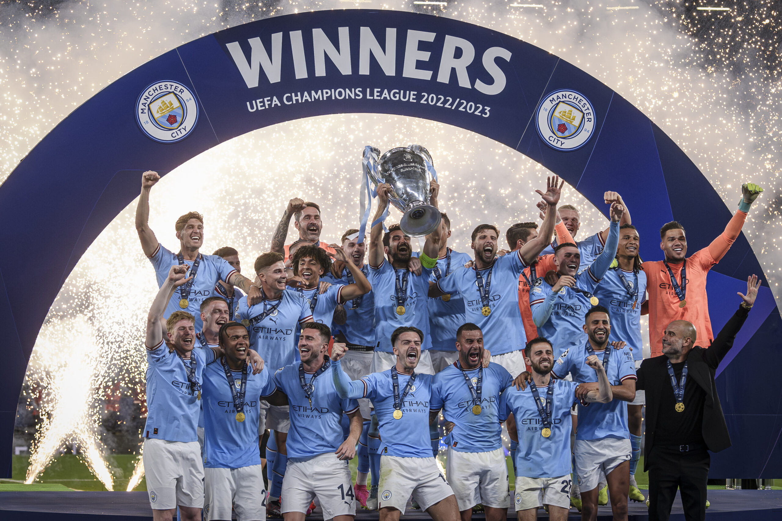 Manchester City players celebrate victory over Inter in the 2023 Champions League final.