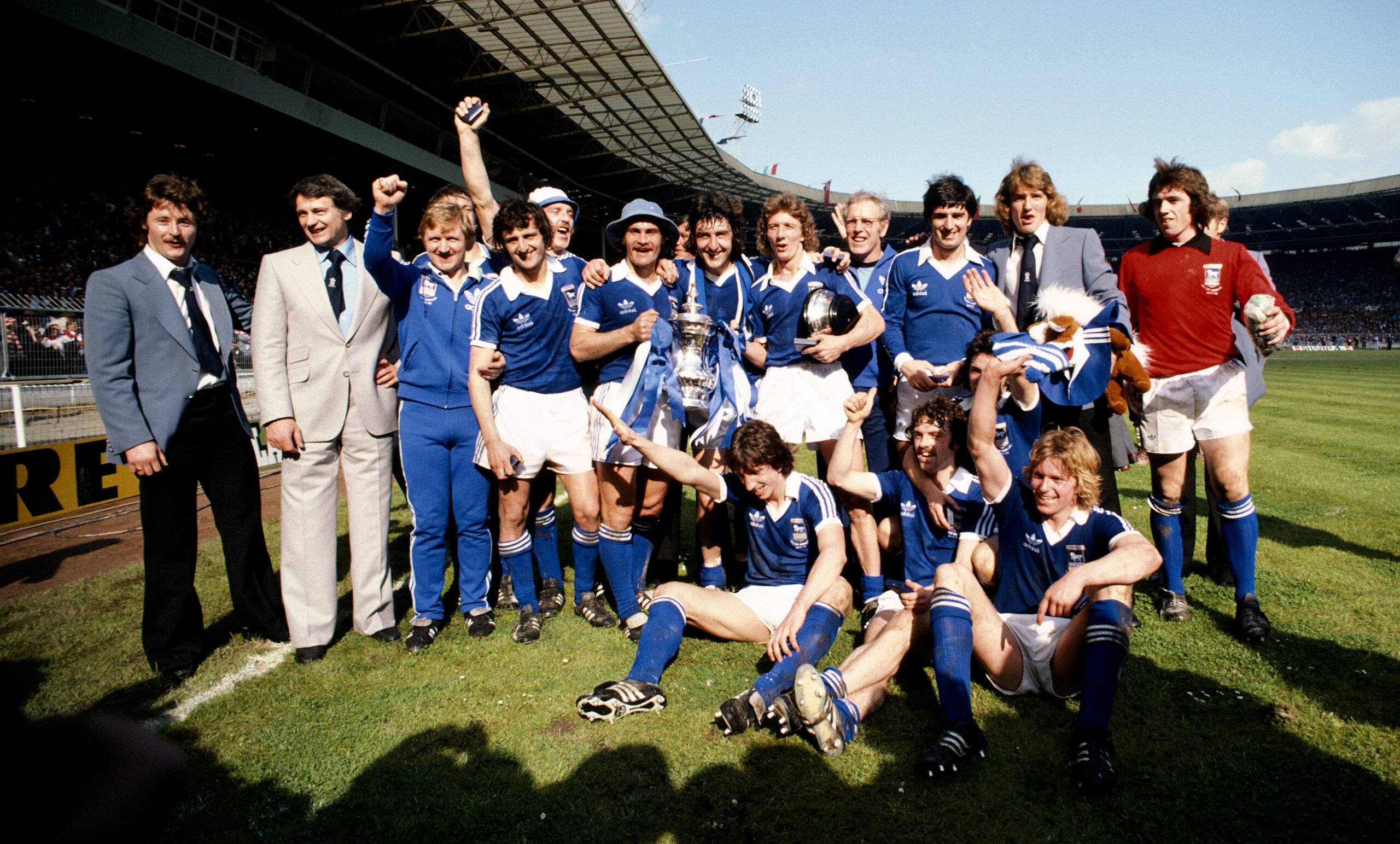 Ipswich Town players and staff celebrate their FA Cup final win over Arsenal in May 1978.