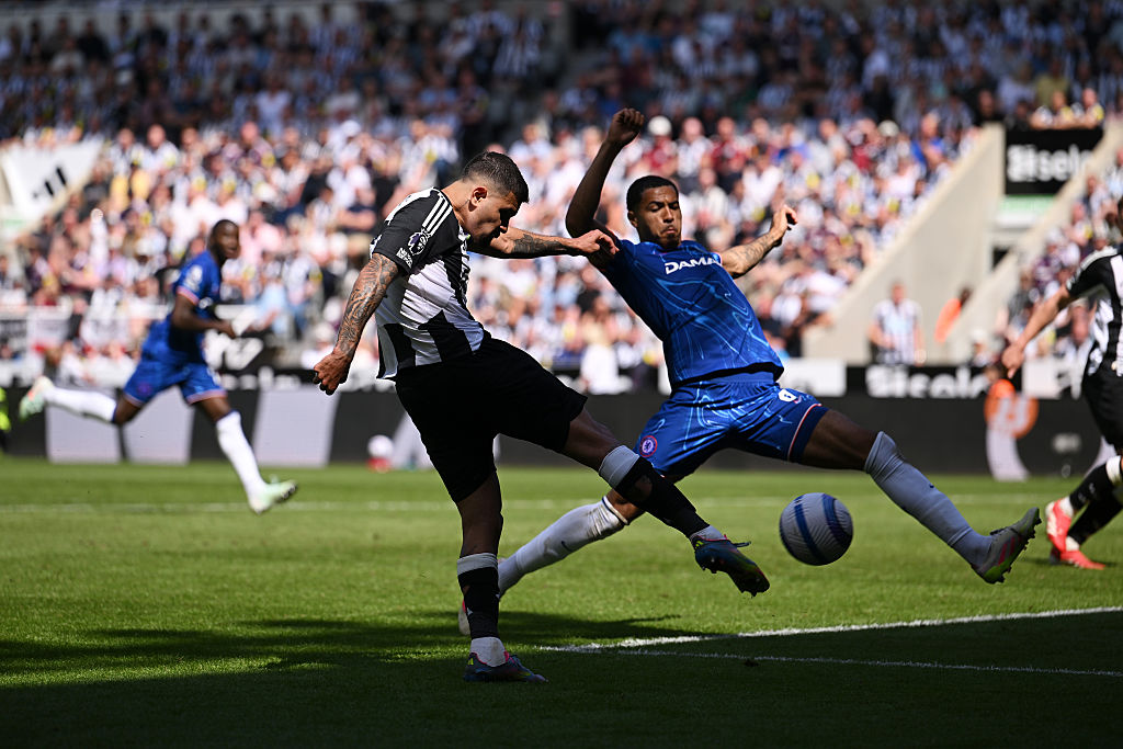 Bruno Guimaraes of Newcastle United shoots wide whilst under pressure from Levi Colwill of Chelsea during the Premier League match between Newcastle United FC and Chelsea FC at St James' Park on May 11, 2025 in Newcastle upon Tyne, England.
