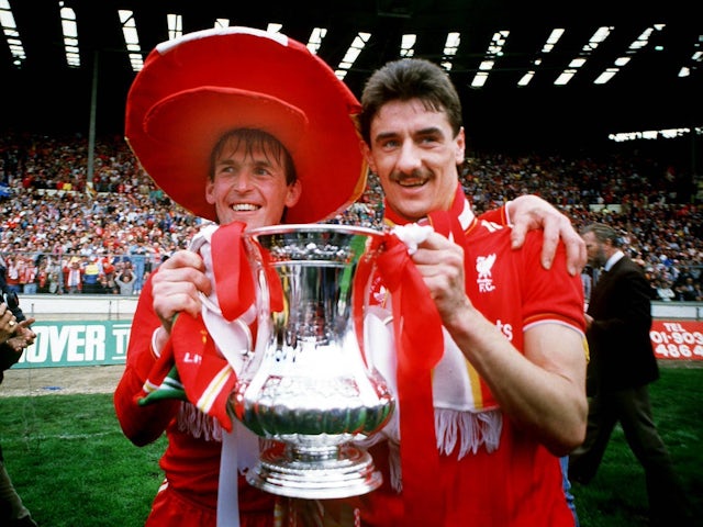 Liverpool's Sir Kenny Dalglish and Ian Rush celebrate winning the FA Cup on May 10, 1986
