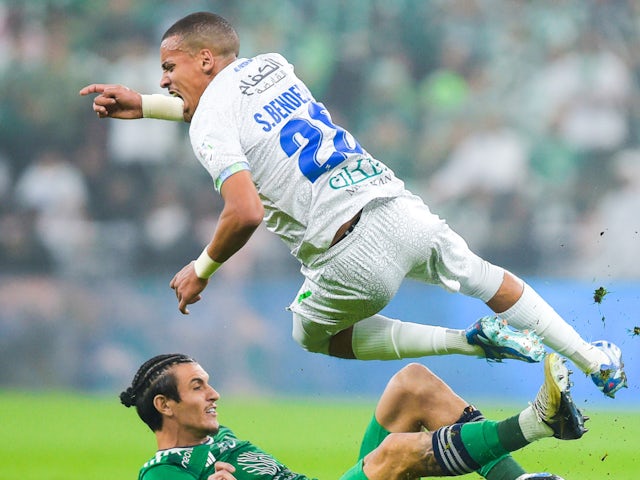 Sofiane Bendebka of Al Fateh tackled by Roger Ibanez of Al-Ahli on March 2, 2024