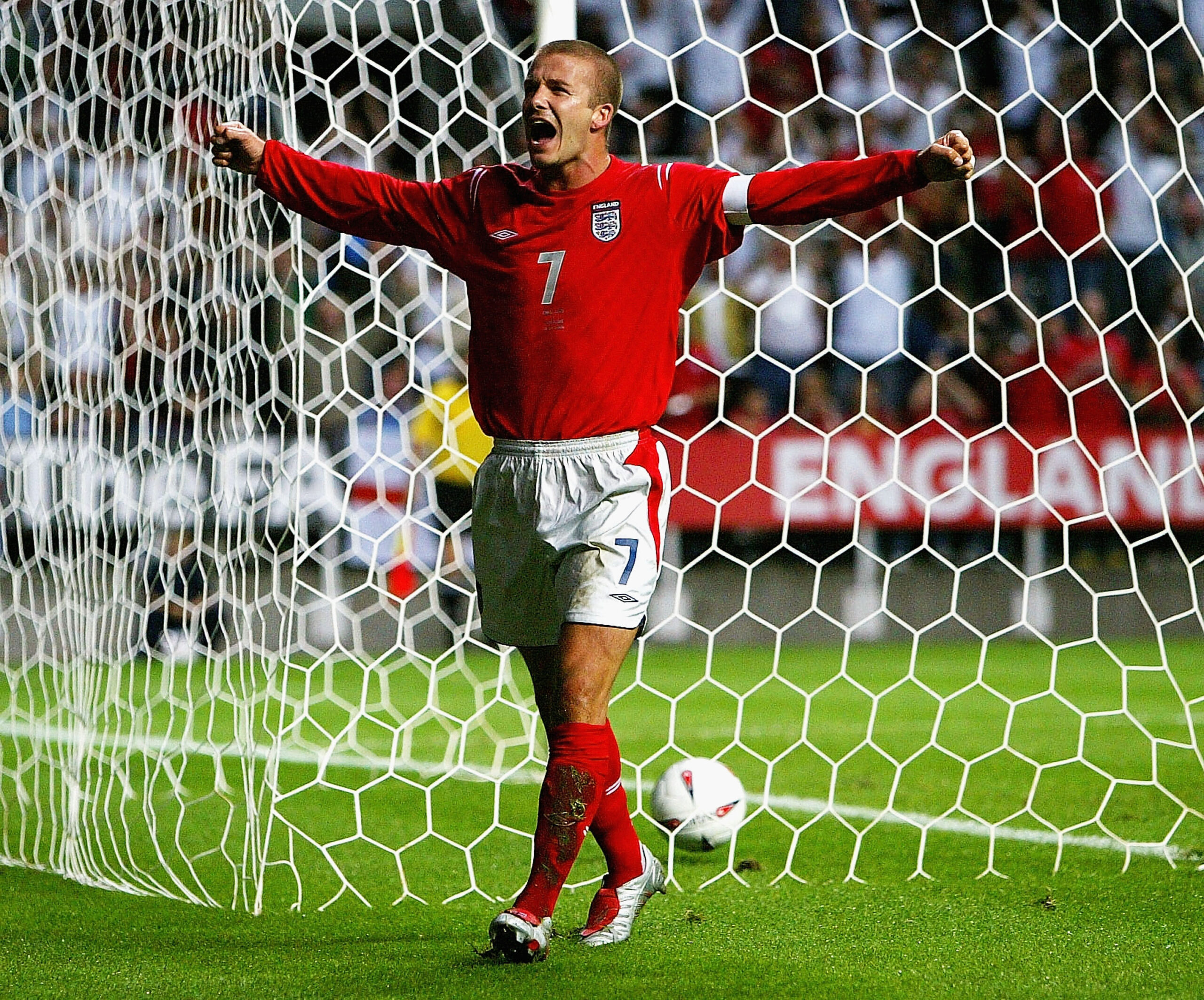 David Beckham celebrates after scoring for England against Ukraine in a friendly in August 2004.