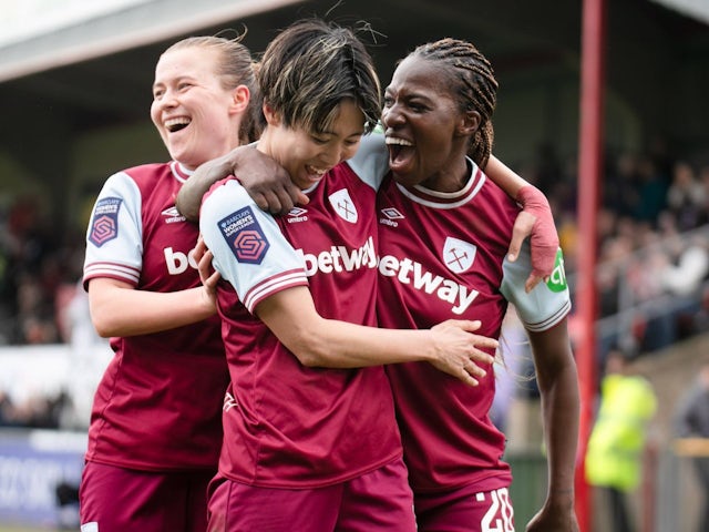 West Ham United Women's Viviane Asseyi celebrates with her teammates on March 23, 2025