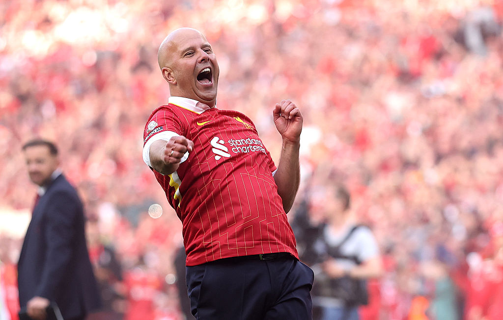 Arne Slot, Manger of Liverpool, celebrates the teams victory and confirmation of winning the Premier League title after the Premier League match between Liverpool FC and Tottenham Hotspur at Anfield on April 27, 2025 in Liverpool, England.