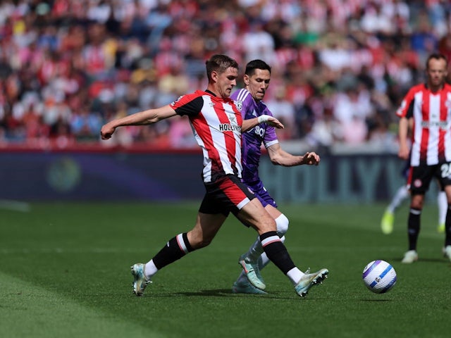 Yehor Yarmoliuk of Brentford challenged by Sasa Lukic of Fulham, on May 18, 2025