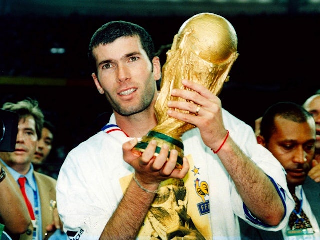 France's Zinedine Zidane celebrates with the 1998 World Cup trophy