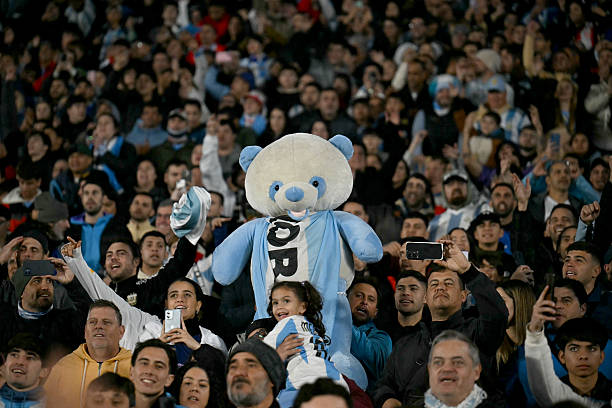 Fans of Argentina cheer for their team during the 2026 FIFA World Cup South American qualifiers football match between Argentina and Colombia at the Mas Monumental stadium in Buenos Aires, on June 10, 2025.