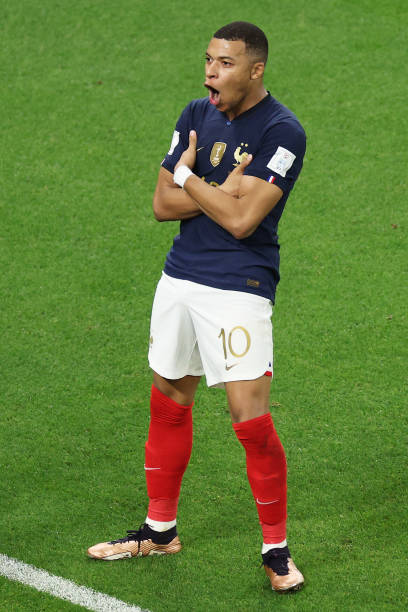 Kylian Mbappé best football celebrations DOHA, QATAR - DECEMBER 04: Kylian Mbappe of France celebrates after scoring the team's third goal during the FIFA World Cup Qatar 2022 Round of 16 match between France and Poland at Al Thumama Stadium on December 04, 2022 in Doha, Qatar.