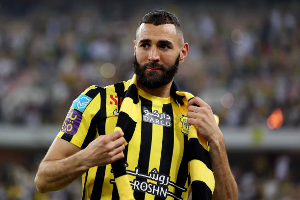 Karim Benzema Al-Ittihad best football clubs in Saudi Arabia JEDDAH, SAUDI ARABIA - JUNE 08: Karim Benzema looks on as they are presented to the crowd during the Karim Benzema Official Reception event at King Abdullah Sports City on June 08, 2023 in Jeddah, Saudi Arabia.