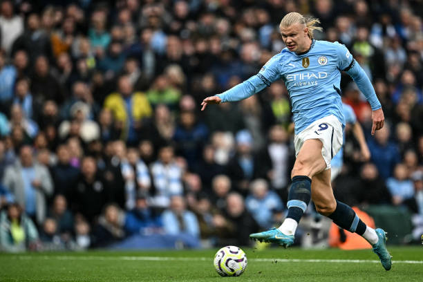 Has Haaland has Turned the Premier League to a Farmer's League? Manchester City's Norwegian striker #09 Erling Haaland scores the team's first goal during the English Premier League football match between Manchester City and Arsenal at the Etihad Stadium in Manchester, north west England, on September 22, 2024. (Photo by Paul ELLIS / AFP) / RESTRICTED TO EDITORIAL USE. No use with unauthorized audio, video, data, fixture lists, club/league logos or 'live' services. Online in-match use limited to 120 images. An additional 40 images may be used in extra time. No video emulation. Social media in-match use limited to 120 images. An additional 40 images may be used in extra time. No use in betting publications, games or single club/league/player publications. /