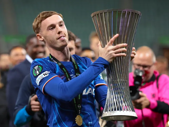 Chelsea's Cole Palmer celebrates with the Conference League trophy on May 28, 2025