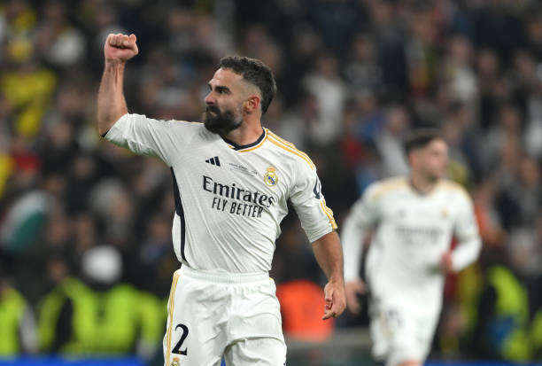 Dani Carvajal soccer players who tuck their shirt in LONDON, ENGLAND - JUNE 01: Daniel Carvajal of Real Madrid celebrates scoring his team's first goal during the UEFA Champions League 2023/24 Final match between Borussia Dortmund and Real Madrid CF at Wembley Stadium on June 01, 2024 in London, England